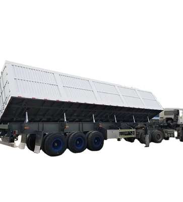 CIMC Tri axle Side Tipper 70 Tons allows goods to be unloaded from the side transporting building materials dump semi trailer