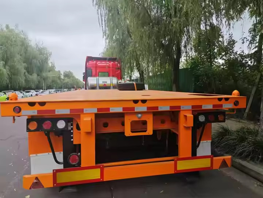 Double Axles Iron Texture Length From 10m To 20m Heavy Duty Low Flatbed Transport Truck Semi Trailer